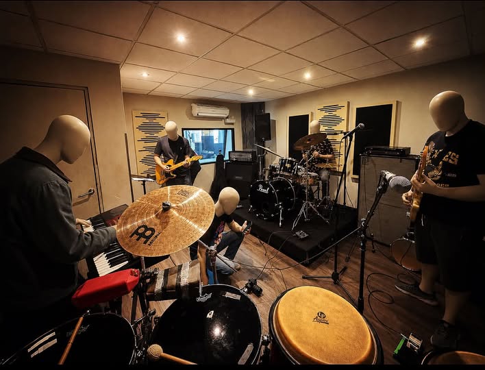 May be an image of saxophone and cymbal